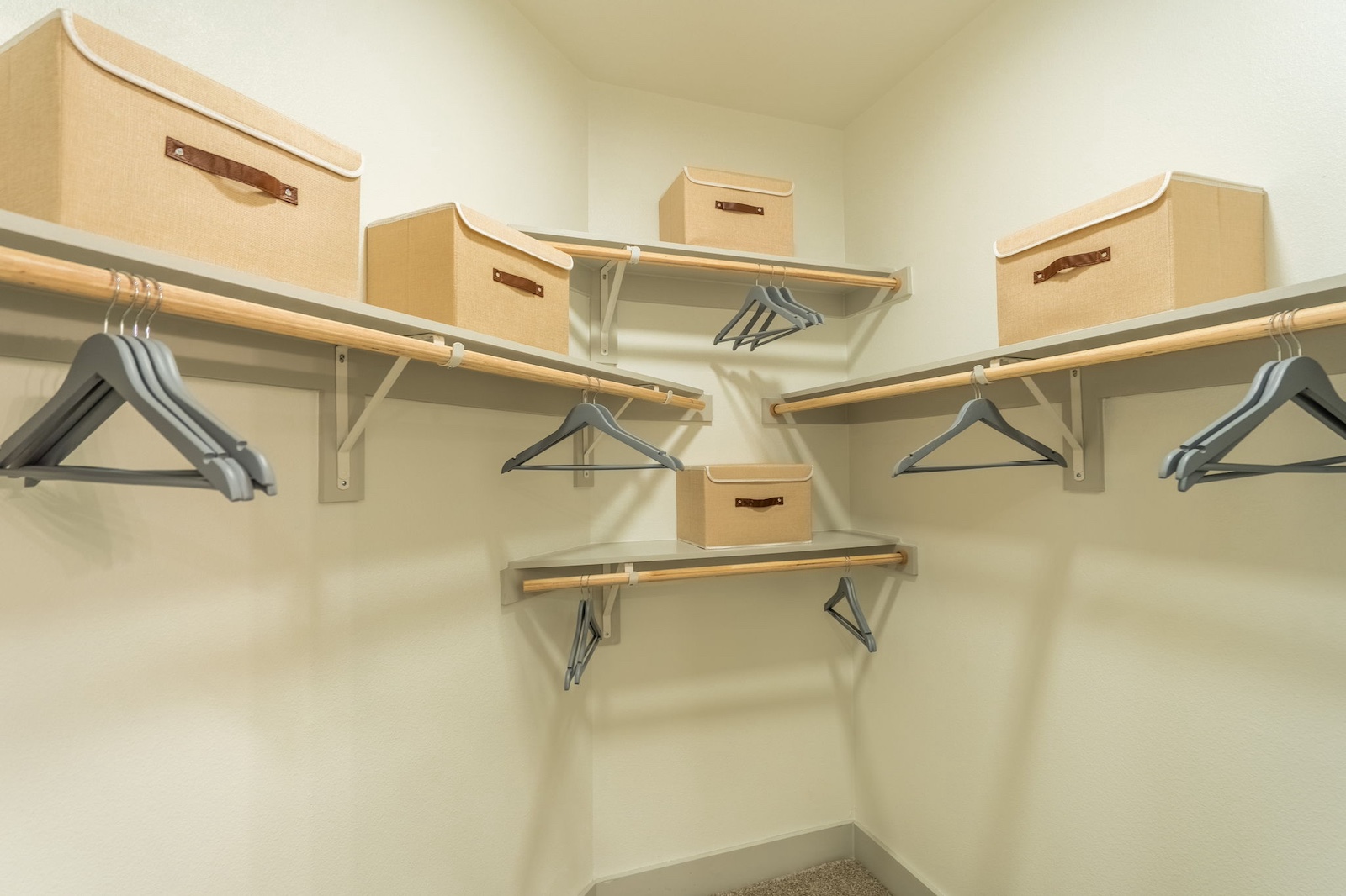 Walk-in closet at our apartments in Cypress, Texas. Residences